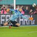 When a ball changes direction, our brain presumes it will continue along its old trajectory until it receives new information from the eyes. This can take up to 120 milliseconds, which is often too late for a despairing goalkeeper. Shutterstock/Herbert Kratky